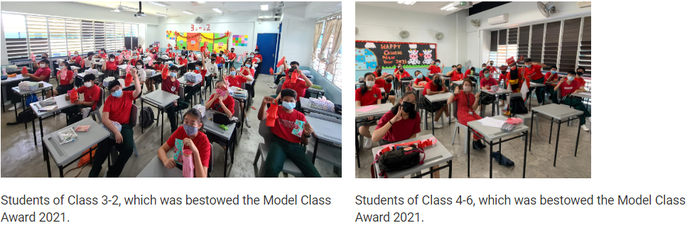 Students in red shirts and face masks sit at desks in two classrooms decorated for Chinese New Year 2021.